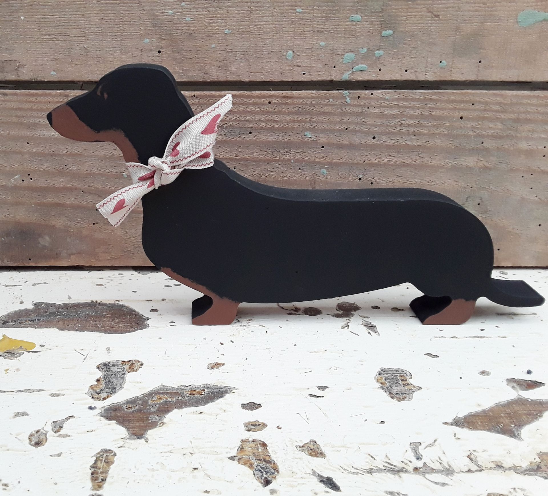 Wooden sausage dog top