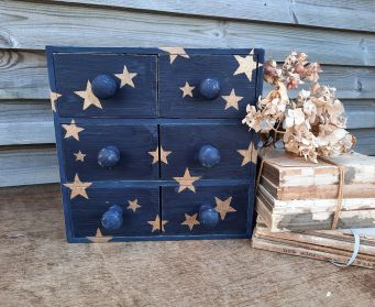 Painted Blue Wooden Drawers With Gold Stars