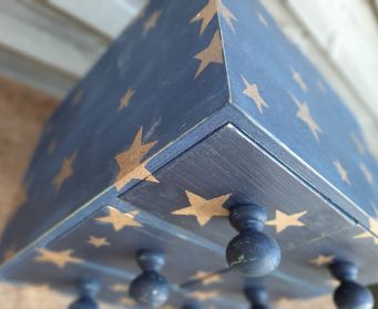 Painted Blue Wooden Drawers With Gold Stars