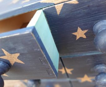 Painted Blue Wooden Drawers With Gold Stars