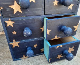 Painted Blue Wooden Drawers With Gold Stars