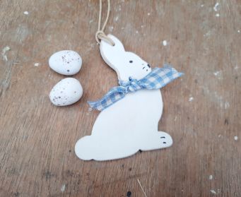 White Wooden Bunny Tail Decoration With A Bow