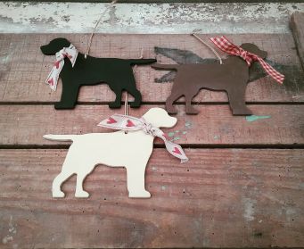 A Trio of Large Painted Hanging Labrador Decorations