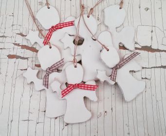 A Collection of Painted Wooden Angels