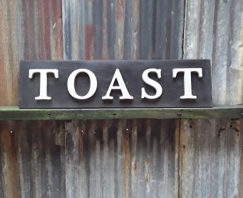 Black And Grey Painted Wooden TOAST Sign