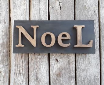 Painted NoeL Sign