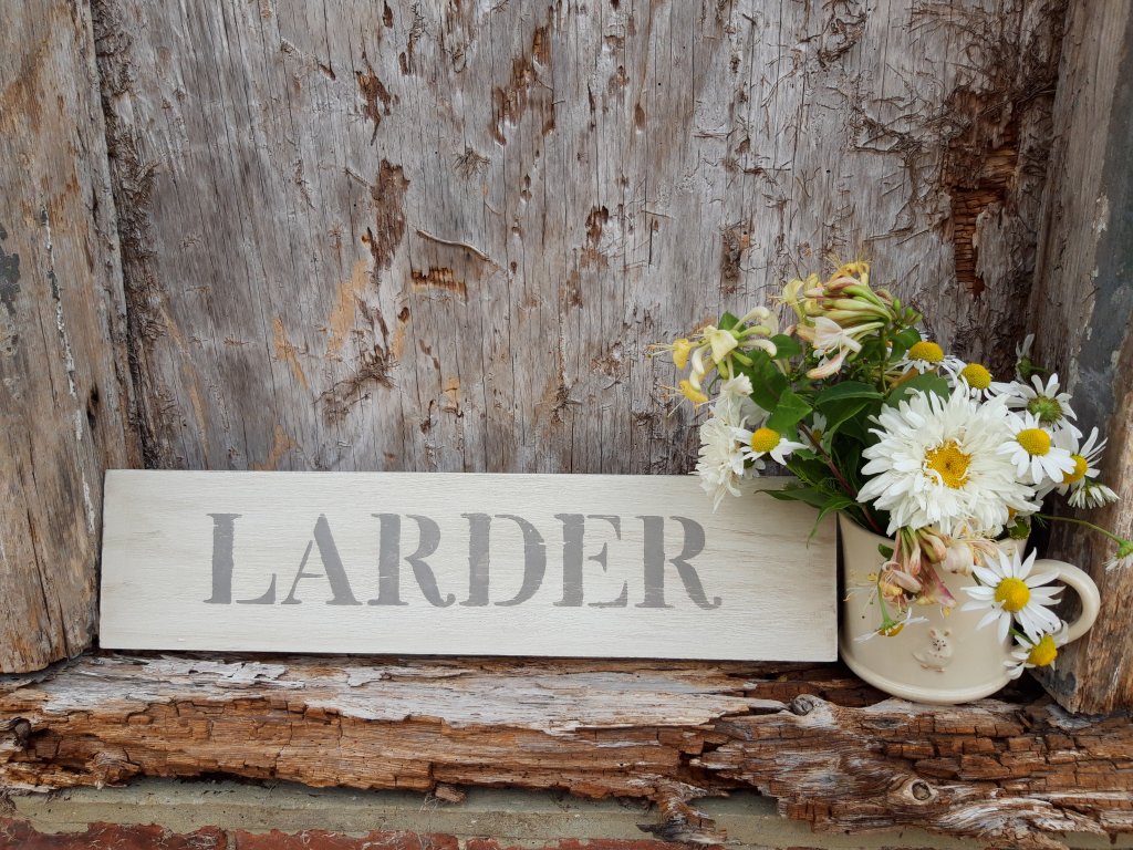 Stencilled LARDER Sign