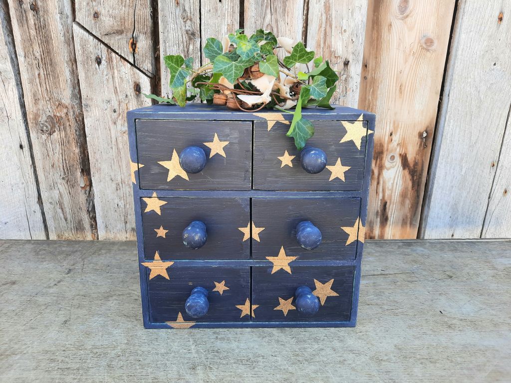 Painted Blue Wooden Drawers With Gold Stars