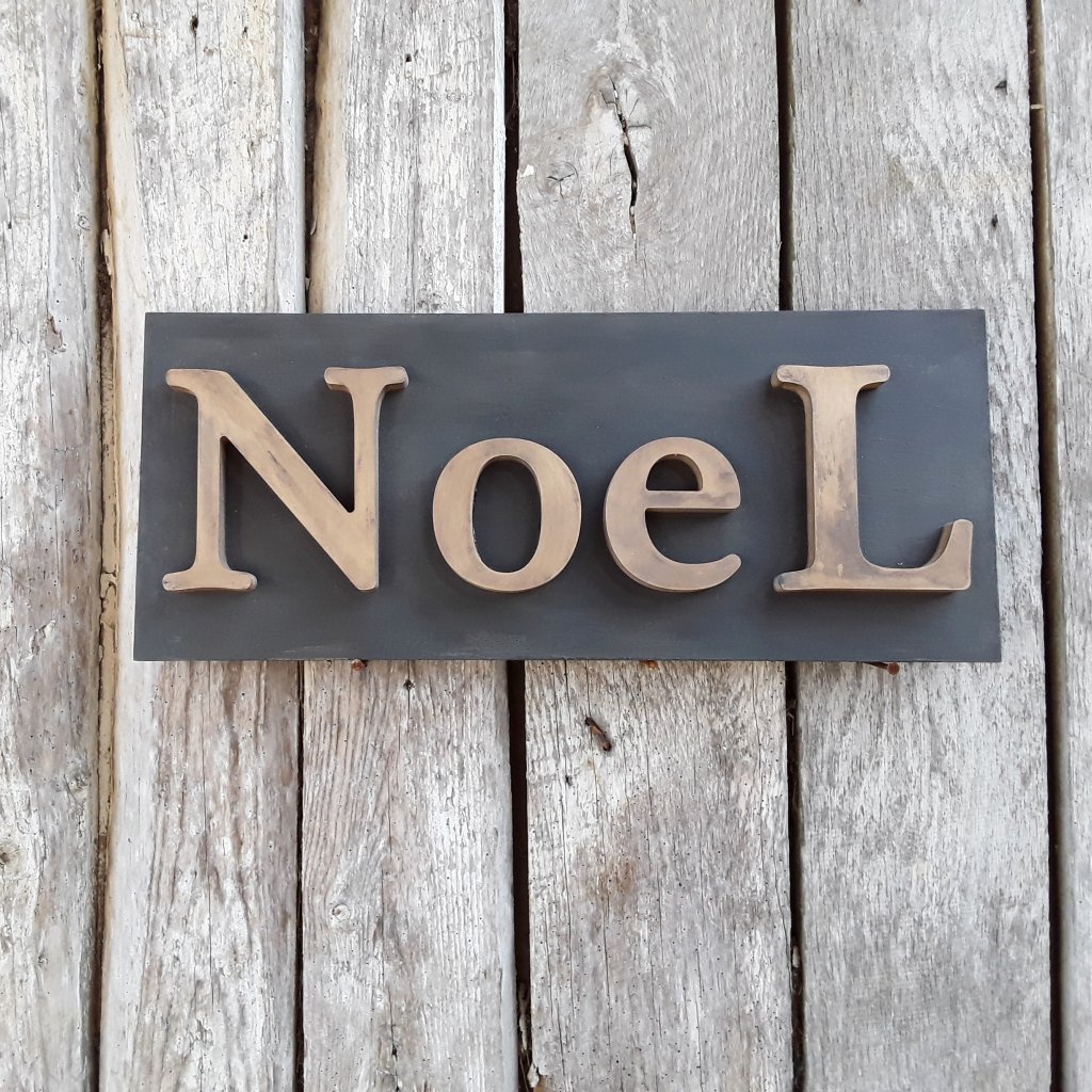 Painted NoeL Sign